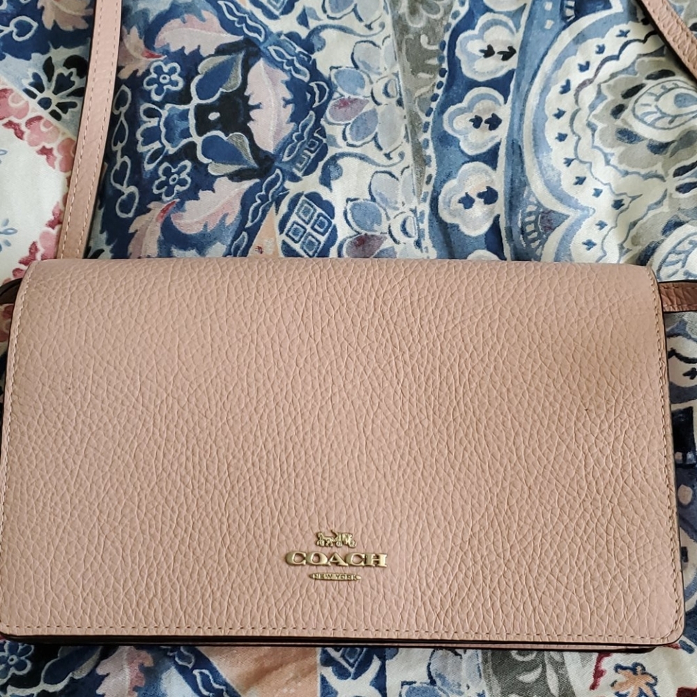 Nwt Coach crossbody mini purse in color baby pink!